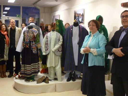 Dr Gillian Vogelsang-Eastwood, director TRC, and H.E. The Honorary Afghan Consul in Rotterdam, Mr Ehsan Turabaz, conducting the opening of the exhibition Well-Dressed Afghanistan
